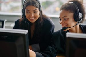 Sales representatives using CRM to help resolve customer issues